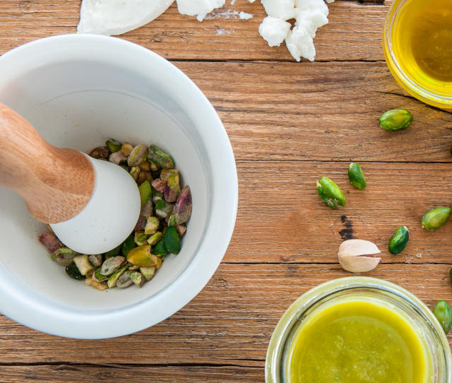 Pesto with pistachios, mortar and pestle