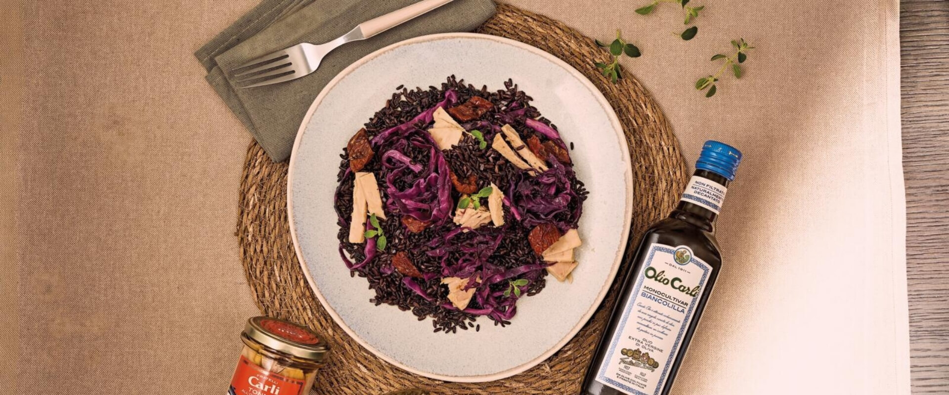Black rice and red cabbage with tuna, sun-dried tomatoes, and extra virgin olive oil