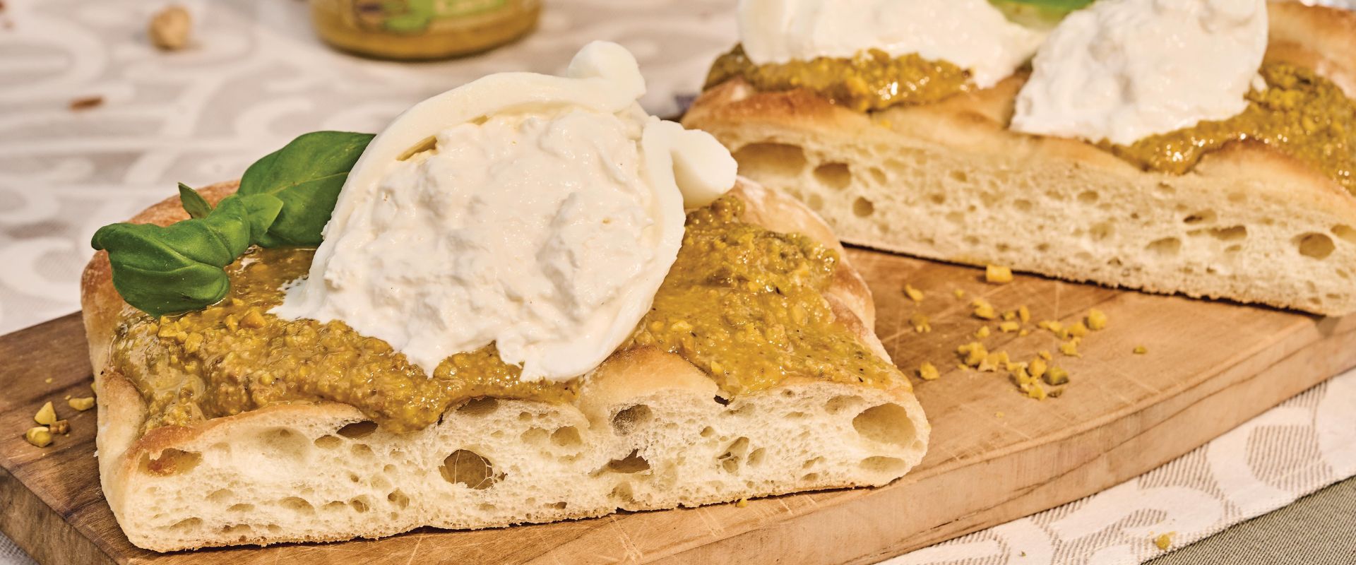 Soft focaccia with burrata and pistachio pesto