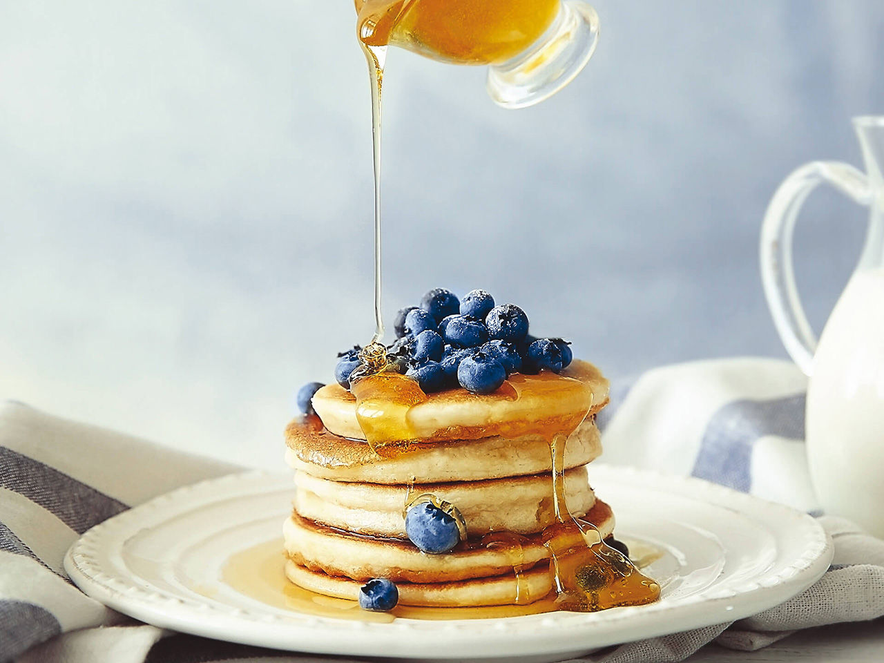 pancake with honey and blueberries