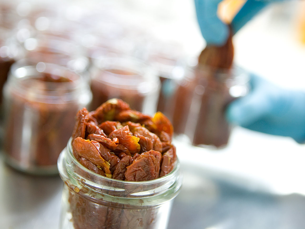 Dried tomatoes in jars
