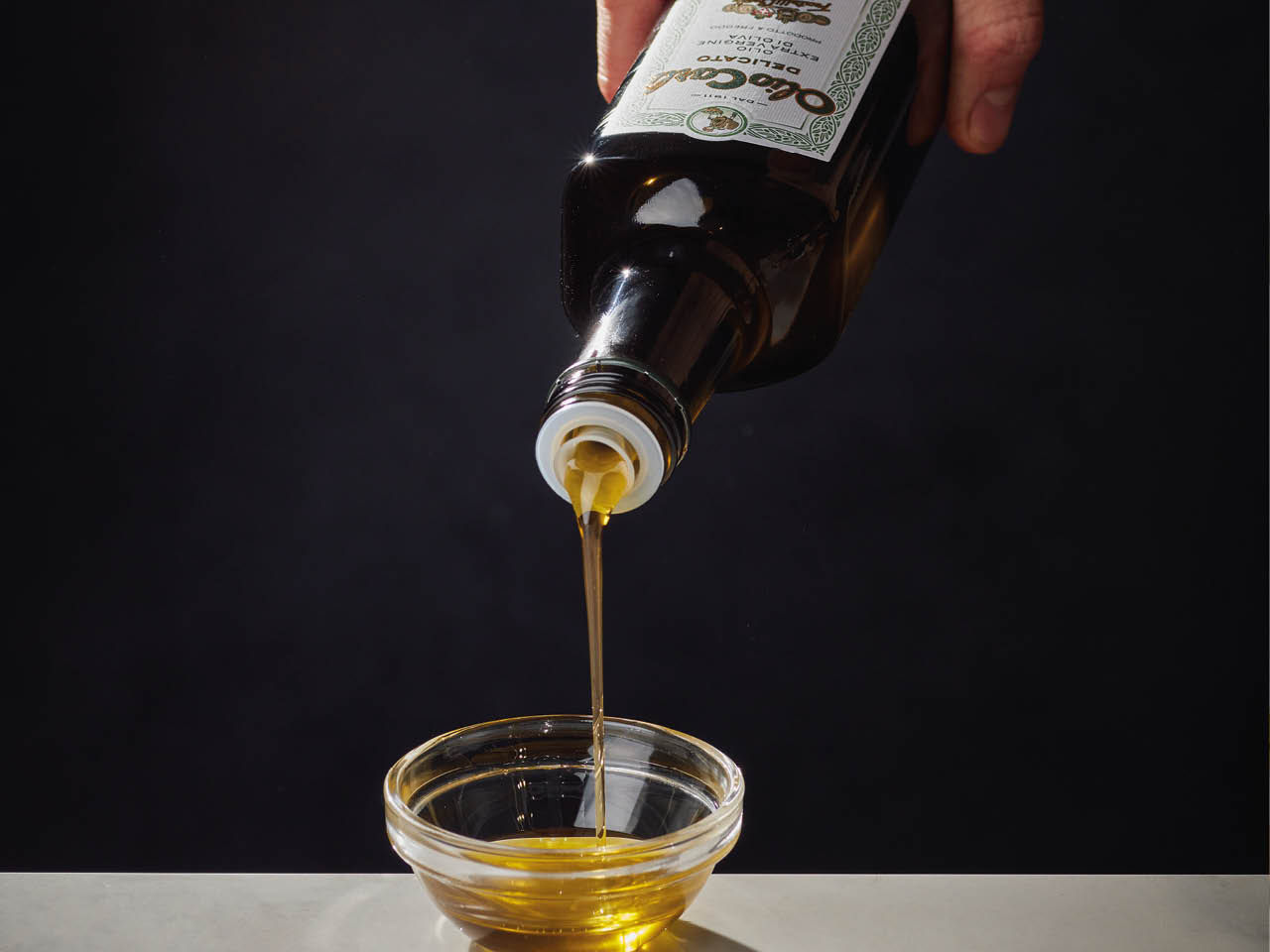 Olive oil poured into a bowl