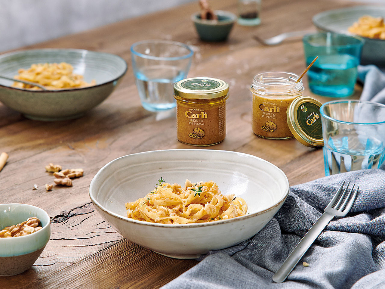 Plates of spaghetti with walnut sauce